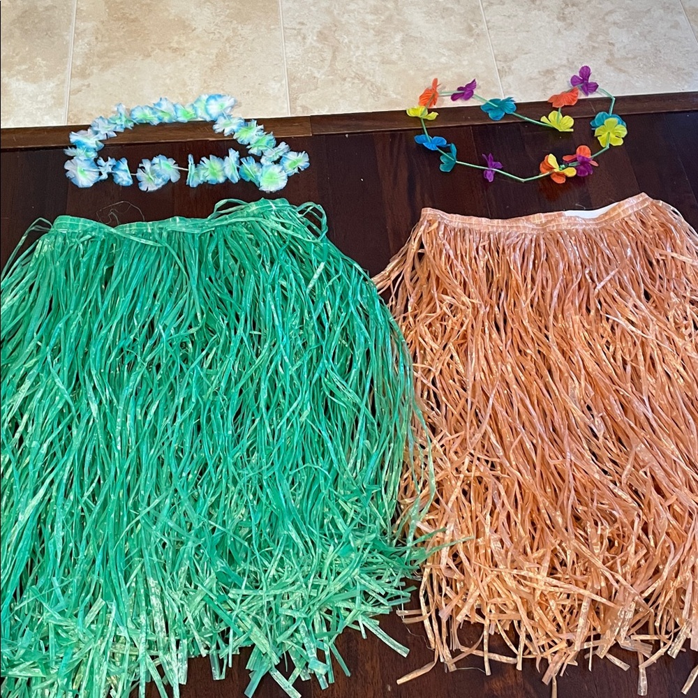 Pair of Green and Orange Hula Skirts with Floral Necklaces